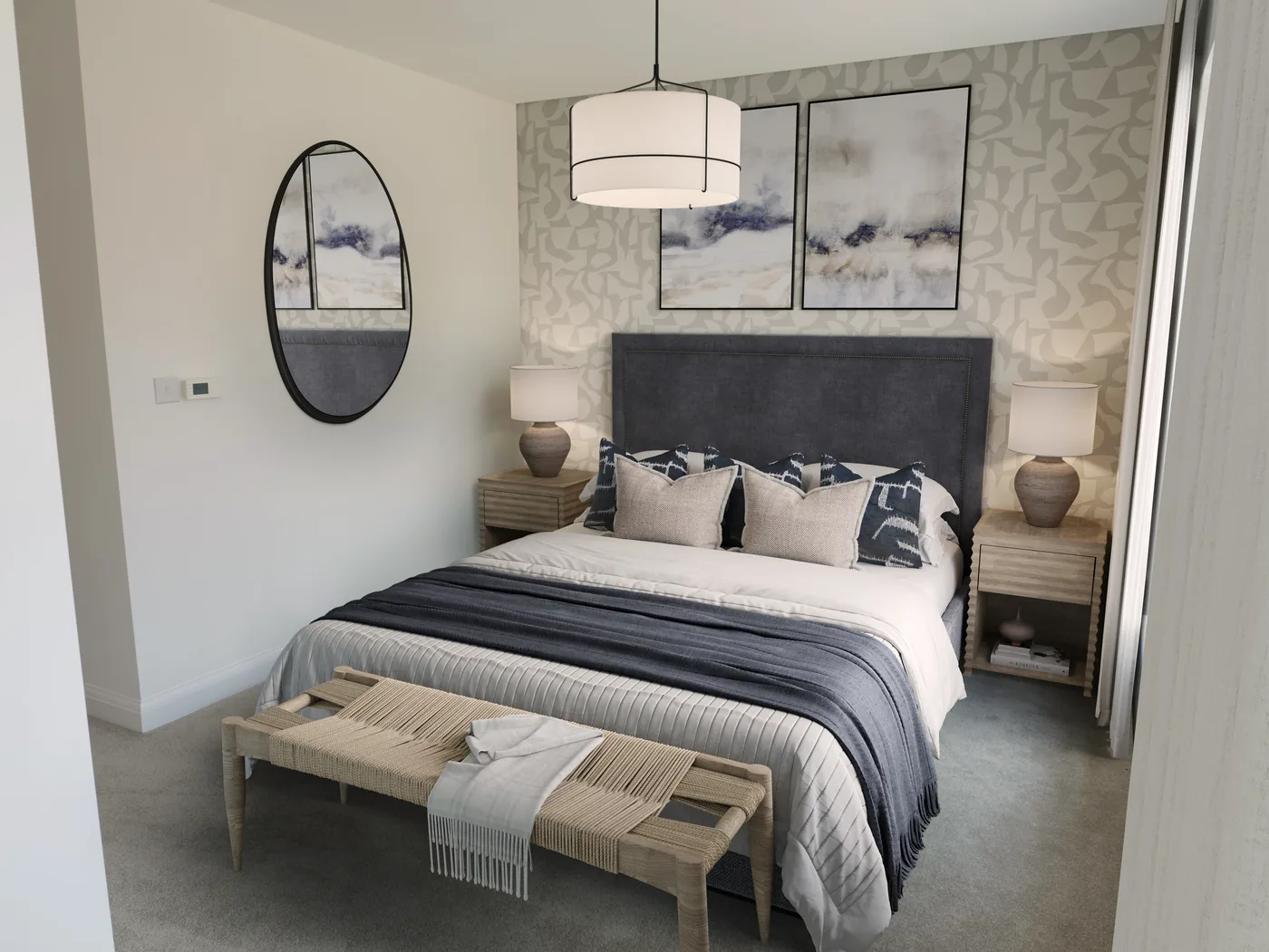 A dressed bedroom with a double bed, patterned feature wall and two bedside lamps