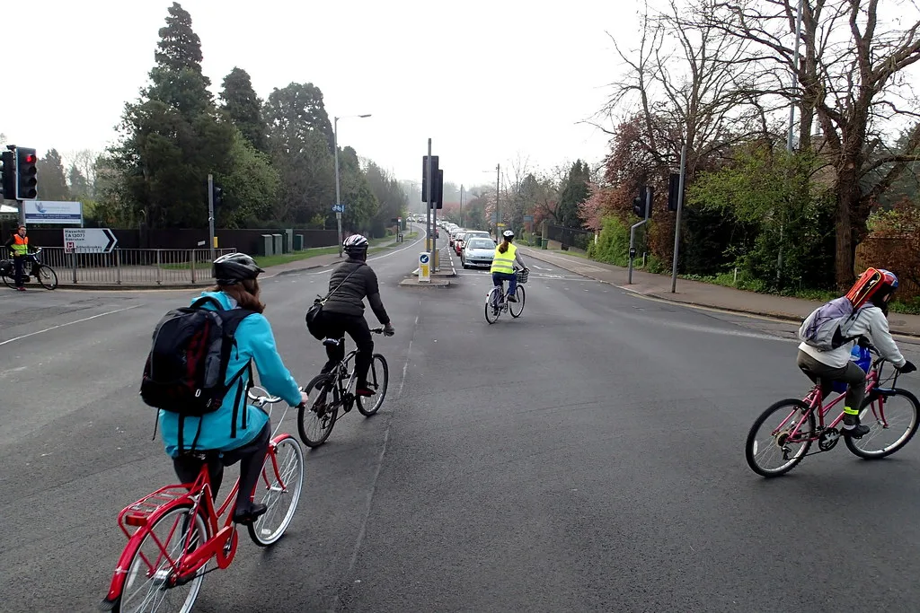Cyclists on Hills Road in April 2014. The photograph shows the road, not the gas main works, which start on 5 October